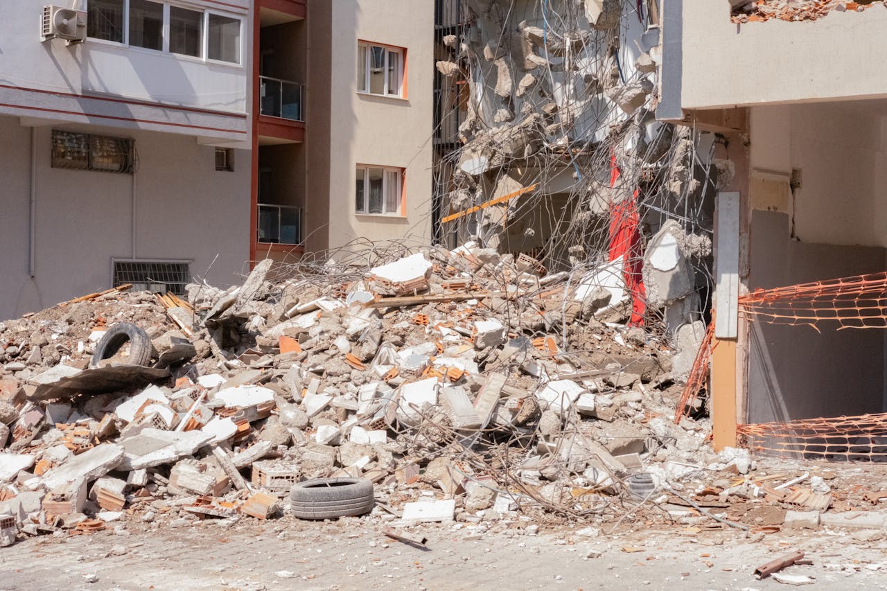 Home Pile of debris and rubble after demolition in an urban area in İzmir, Türkiye.